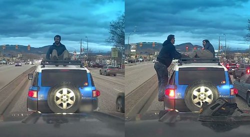 Bizarre Kelowna road incident unfolds after man climbs onto roof of SUV on Hwy 97